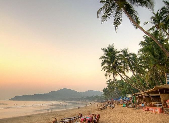 Tourists enjoying Goa beaches, water sports, and sunset views during the 4 Nights 5 Days Goa trip.